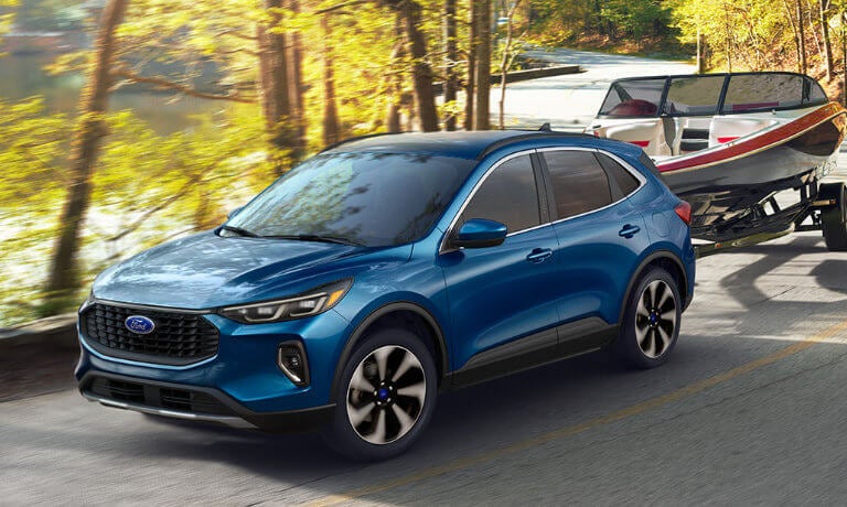 2023 Ford Escape towing a boat