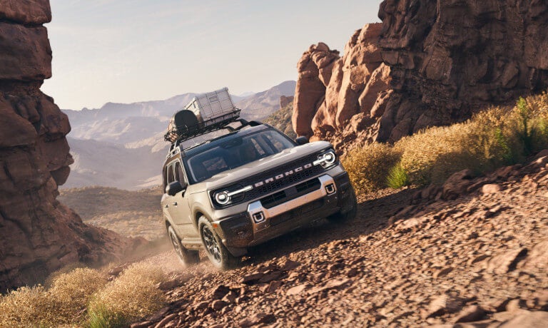 2025 Ford Bronco Sport driving up rocky road