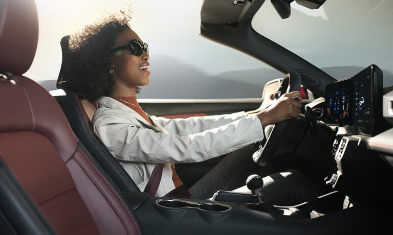 2025 Ford Mustang interior front with driver