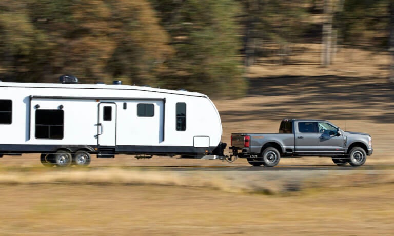 2025 Ford Super Duty towing an RV