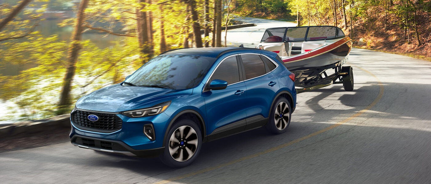 2026 Ford Escape towing a boat