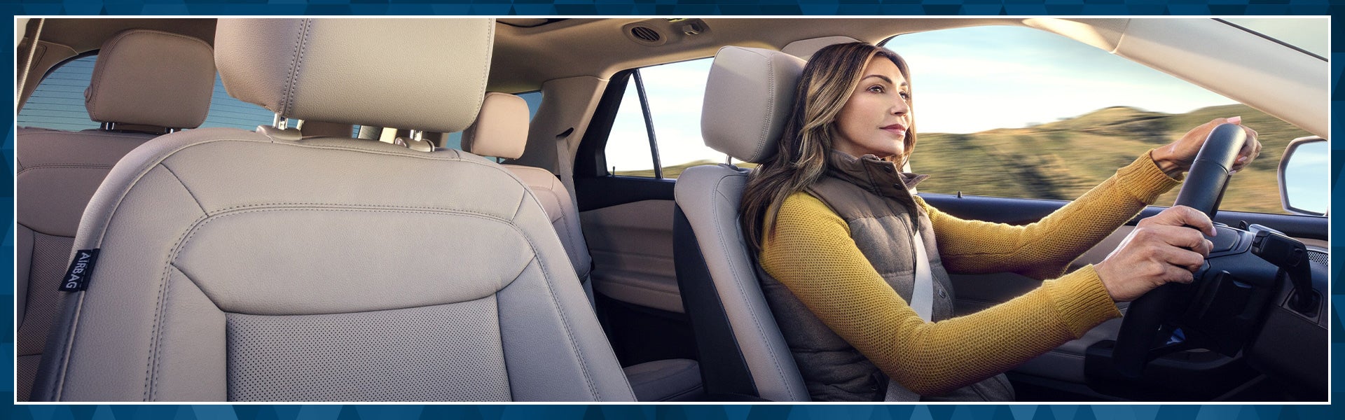 Women in a Ford vehicle driving